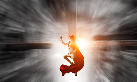 Super woman in skyの写真素材