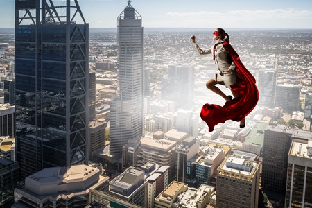 Super woman in skyの写真素材
