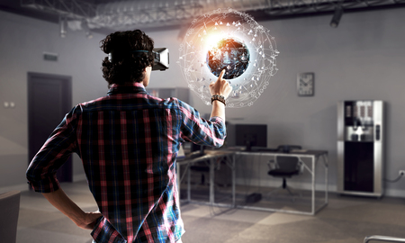 Experiencing virtual technology world. Mixed media