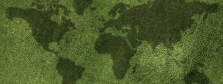 Green grass abstract background and dark shadowsの写真素材