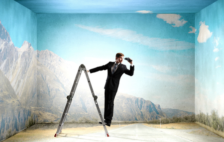 Looking out for business opportunities. Mixed mediaの写真素材