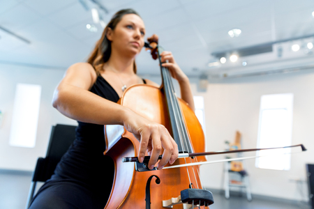 Woman playing celloの写真素材