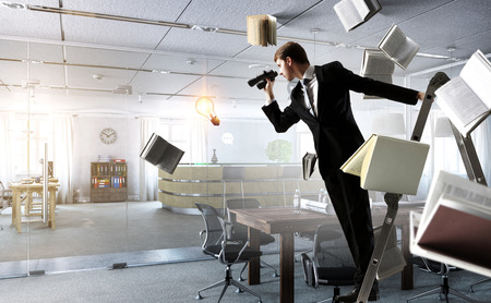 Looking out for business opportunities. Mixed mediaの写真素材