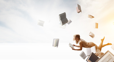When reading takes your away. Mixed mediaの写真素材