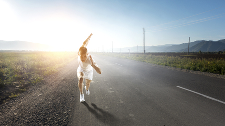 Athlete man running race. Mixed mediaの写真素材