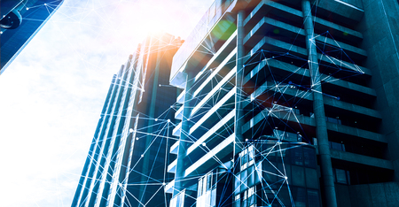 Bottom angle view of glass blue building. 3d renderingの写真素材