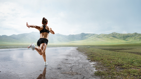 Sportswoman run race. Mixed mediaの写真素材