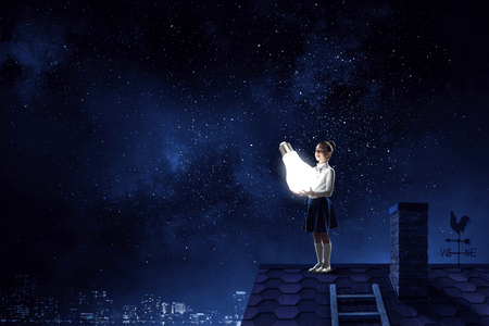 She got bright idea. Mixed mediaの写真素材