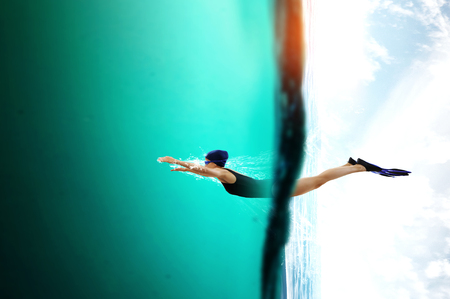 Swimmer in flippers. Mixed mediaの写真素材