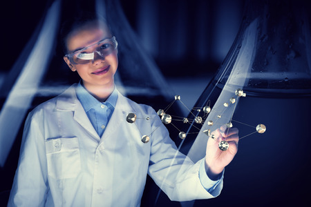 Attractive scientist in laboratory. Mixed mediaの写真素材