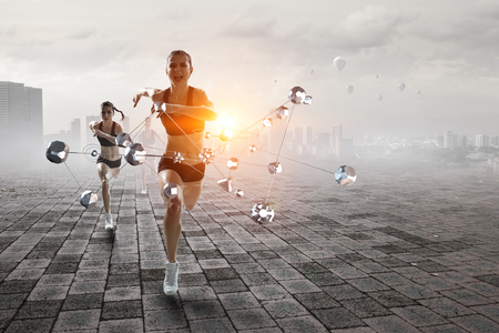 Sportswoman running race. Mixed mediaの写真素材