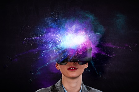 Young female in virtual reality. Mixed media