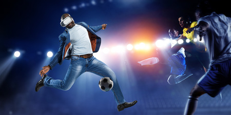 Virtual Reality headset on a black male playing soccer. Mixed Media