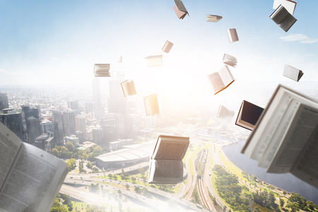 Books flying in the skyの写真素材