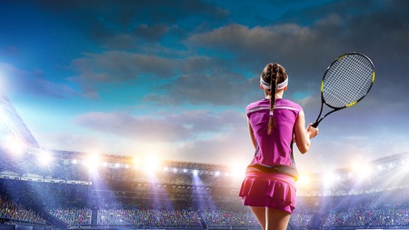 Young woman playing tennis. Mixed mediaの写真素材