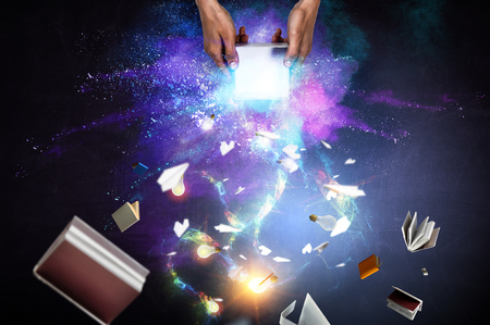 Man s hands holding a small magic cardboard box, mixed mediaの写真素材