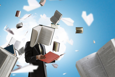 Businessman with book head. Business efficiency concept.の写真素材