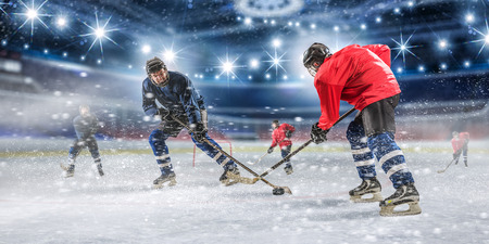 Ice hockey players in actionの写真素材