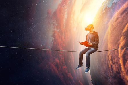 Virtual reality experience, young man in VR glassesの写真素材