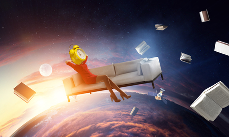 Clock headed woman. Business efficiency concept. Mixed mediaの写真素材