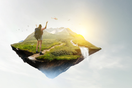 Travelling female tourist with backpackの写真素材