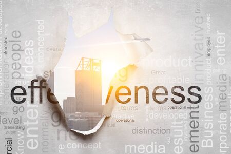 Effect of torn paper hole in the wallの写真素材