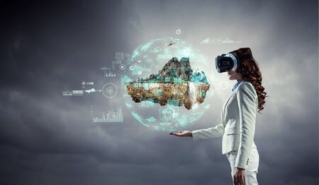 Young female in virtual reality. Mixed media