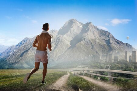 Jogging athletic young manの写真素材