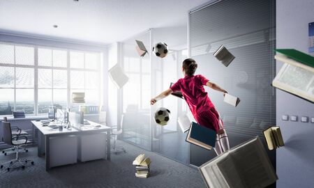 Kid playing soccer. Mixed mediaの写真素材