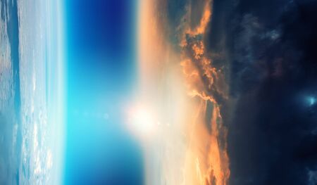 Abstract planets and space texture with sunrise and clouds