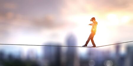 Virtual reality experience. Man wearing VR headsetの写真素材