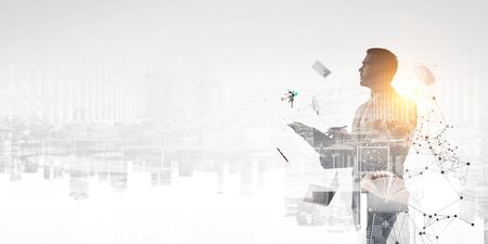 Young businessman at his workの写真素材