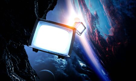 Retro TV flying in space