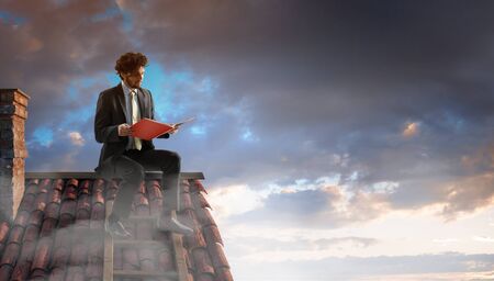 Businessman with book. Business efficiency concept.の写真素材