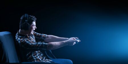 Young man playing video game