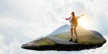 Travelling female tourist with backpack