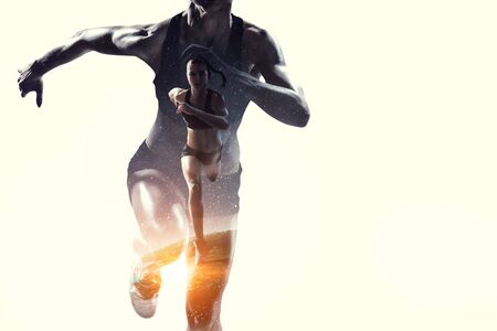 Abstract concept of running young sportswomanの写真素材