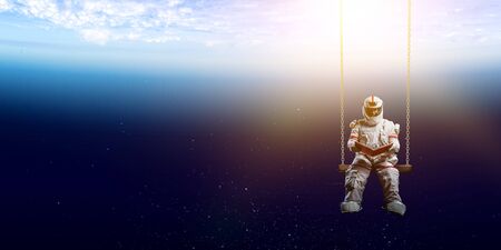 Spaceman and the planet Earth abstract themeの写真素材
