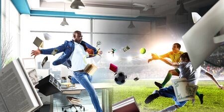 Soccer man in action with ball. Mixed mediaの写真素材