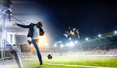 African man in virtual helmet . Mixed mediaの写真素材