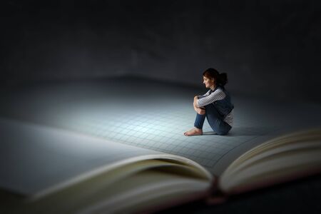 When reading takes you away. Mixed mediaの写真素材
