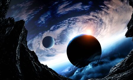 Abstract planets and space texture with sunrise and clouds
