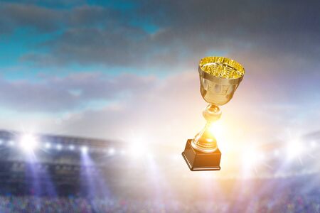 Concept of victory with cup trophy in airの写真素材