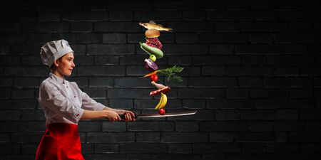 He is crazy about cooking. Mixed mediaの写真素材