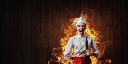 He is crazy about cooking. Mixed mediaの写真素材