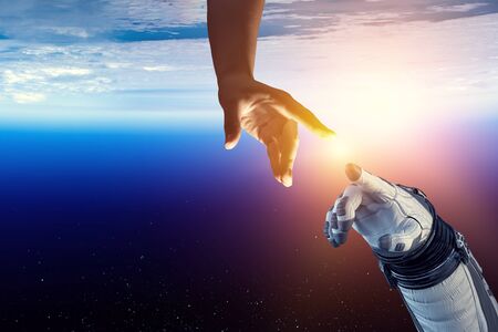 Astronaut hands with background of deep space