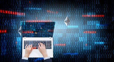 Top view of businesswoman working on laptop and crypto symbols. 3d renderingの写真素材