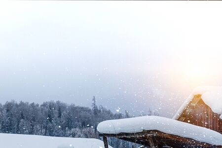 Beautiful sunrise in mountains with white fog below panoramaの写真素材