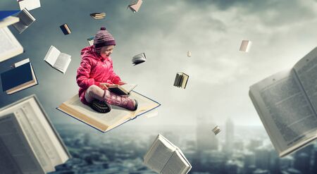 Reading a fairytale. Mixed mediaの写真素材