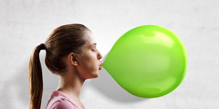 Girl chewing gum . Mixed mediaの写真素材